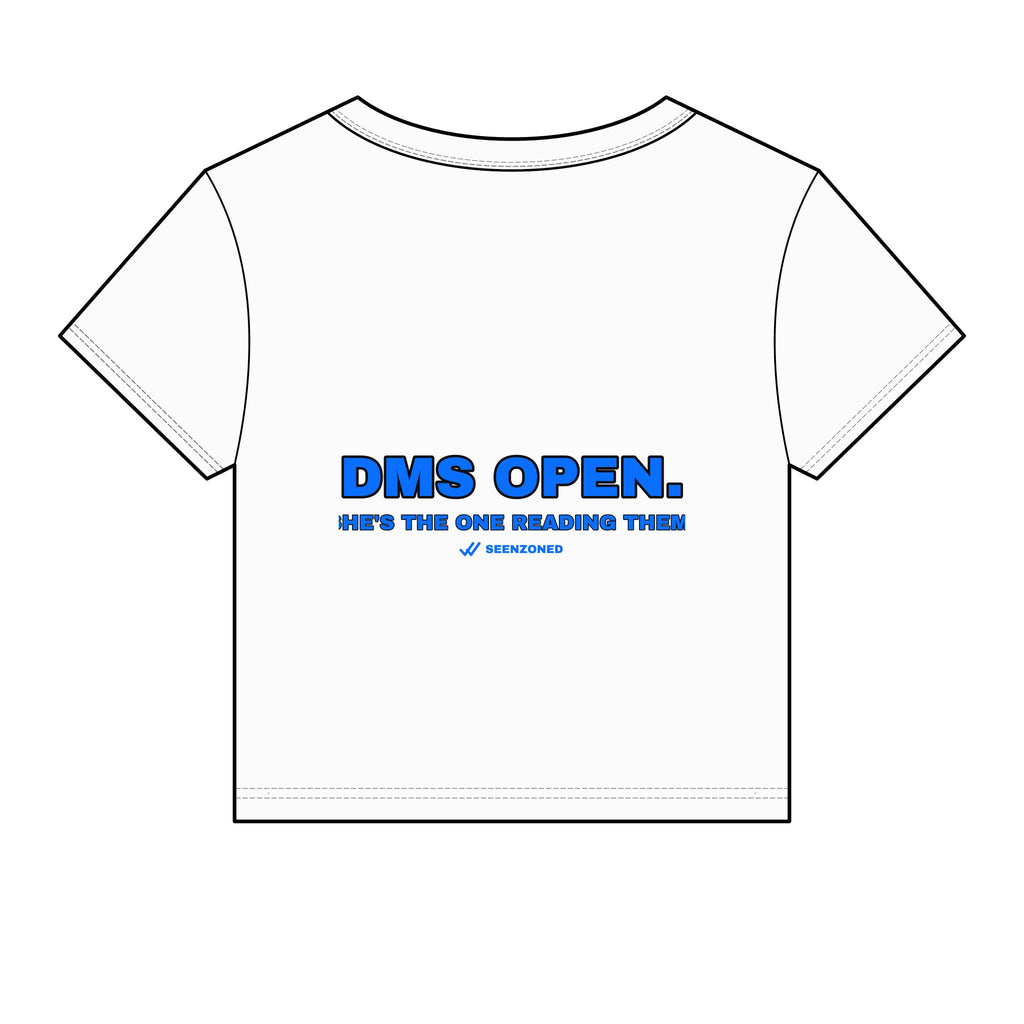 DMs open. She's the one reading them. Baby Tee