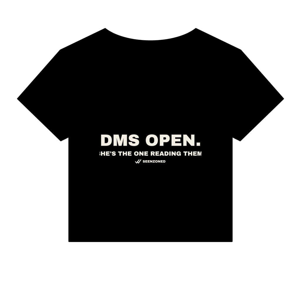 DMs open. She's the one reading them. Baby Tee
