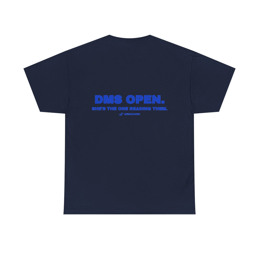 DMs open. She's the one reading them. Tee · Cobalt (dark)