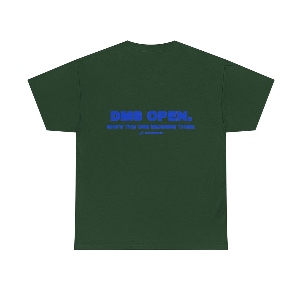 DMs open. She's the one reading them. Tee · Cobalt (dark)